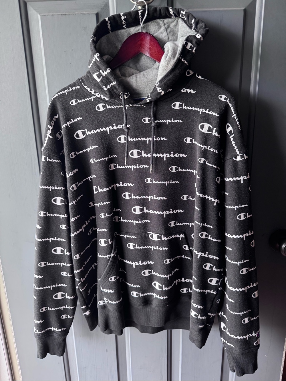 Champion Black Hoodie with White Allover Logo
